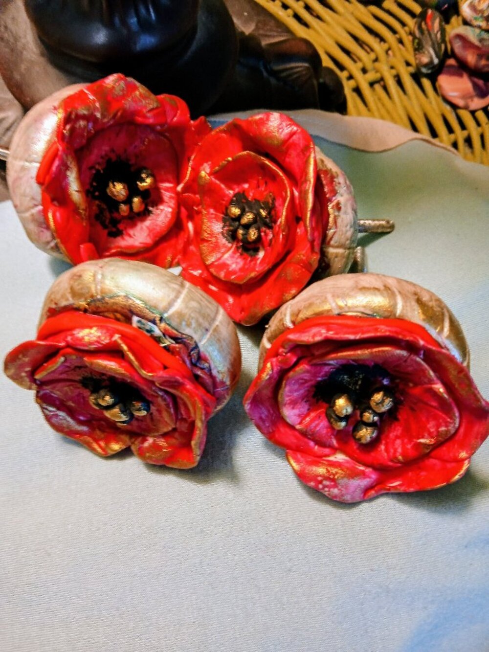 HAND MADE DRAWER PULLS......   MADE OF POLYMER AND AN OLD DOOR KNOB.